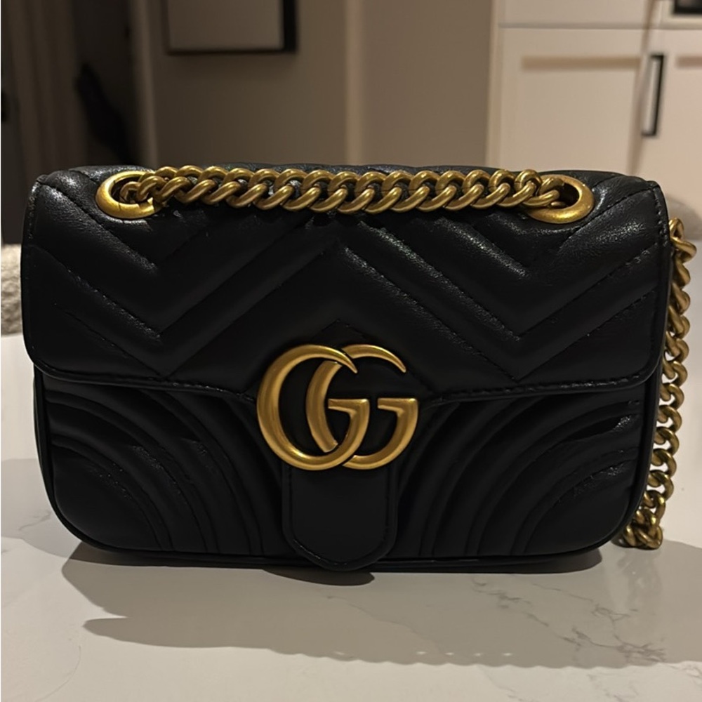 Gucci Black Quilted Crossbody Bag with Gold Accents